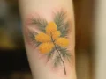 Tatouage mimosa : signification et inspirations pour votre prochain tatouage